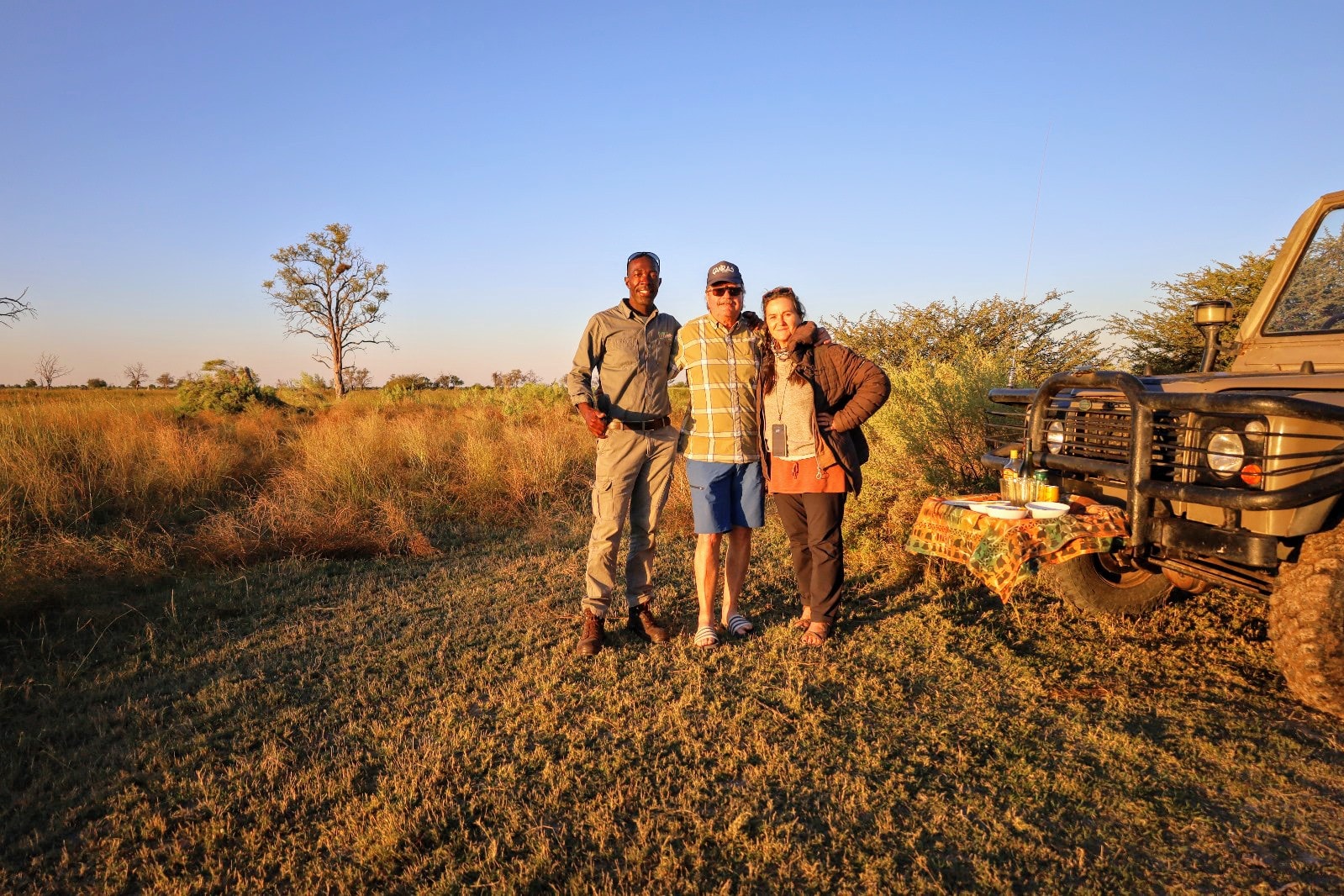 Mobile safari camp at sunset in Botswana